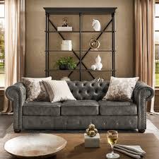 This leather chesterfield sofa showcases a timeless chesterfield silhouette. Tufted Scroll Arm Chesterfield Sofa Alif Furniture