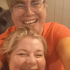 Hi all! I'm a nutty, impulsive, wheely user and this is my with my little  big sister when we did a road trip to visit my daughter and grandson. I've  the grey