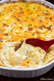 Easy Cheesy Scalloped Potatoes Are Very Similar To Potatoes Au Gratin Because They Are Drenche Easy Cheesy Scalloped Potatoes Scalloped Potatoes Cheesy Recipes