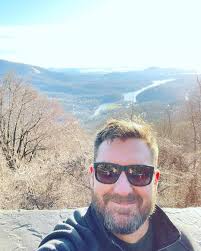 Caption this photo of Mark Bowe and his son