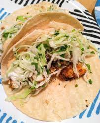 In the bowl of a food processor, blend the garlic and salt until finely chopped. Blackened Fish Tacos With Cilantro Lime Slaw And Chipotle Aioli I Ll Have Seconds