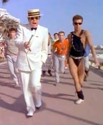 Elton John I M Still Standing Video Which Was Filmed Along The Promenade Des Anglais In Nice Elton John Costume Elton John Elton John Quotes