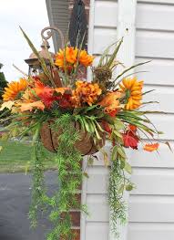 The most common artificial flower hanging basket material is silk. Silk Hanging Plant Fall Mums By Silkeleganceflorals On Etsy 45 95 Artificial Hanging Plants Hanging Plants Artificial Plant Wall