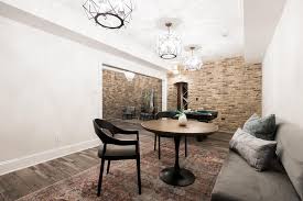 The floor seems to always be damp, but there is a sump pump back there. Basement Design With Exposed Brick Walls Hgtv