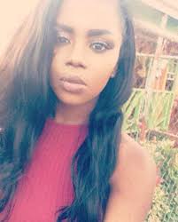 I discovered a hard, not painful lump within my lower lip. Top photo is  relaxed, bottom photo is with my tongue pushed behind it. It looks blue to  white? I don't remember