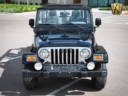 Image result for Brilliant Black 2005 Jeep