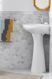 this compact, corner pedestal sink by