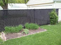 A shadowbox fence provides the same look on both sides of the fence. M D Building Products M D 5 Ft Privacy Fence Slat Black Vs003123bk060 The Home Depot Backyard Fences Fence Slats Backyard Landscaping