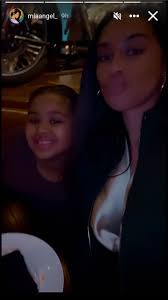 Carmelo Anthony's ex Mia Burks poses for a selfie as she enjoys Christmas  night out with their daughter