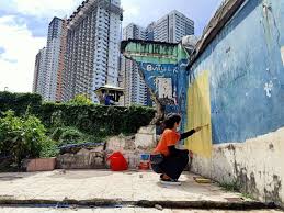 Be part of the roquenian family and let's build your child's future together! San Roque Volunteers Paint Over Acab Mural Preps For Community Learning Continue Philstar Com