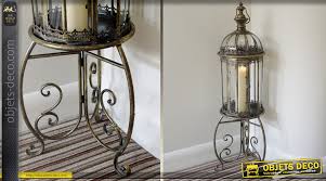 Sublimez votre intérieur avec cette magnifique lanterne sur pied. Grande Lanterne Finition Bronze Antique Sur Pied 115 Cm