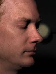 Analysis of Human Faces using a Measurement-Based Skin Reflectance Model