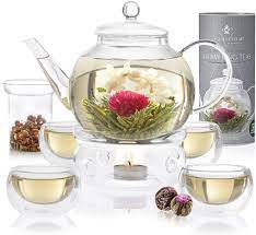 The glass in this tea maker does not retain flavors, giving you the option. Amazon Com Teabloom Celebration Complete Tea Set Stovetop Safe Glass Teapot 40 Oz 1 2 L With 4 Double Wall Glass Teacups Tea Warmer Removable Loose Tea Glass Infuser 12 Flowering Teas Teapots