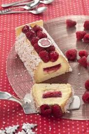 La Buche Tropezienne C Est Une Brioche Et La Creme Tropezienne Avec Un Cœur Confit De Framboises Le Tout Nappe Avec A Chaque Extremite Un Carre De Chocolat V