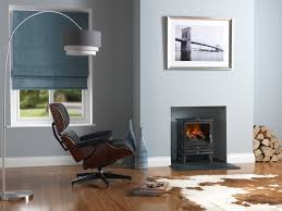 Many electric fireplaces fit up against a wall, but you can also choose a corner electric fireplace to create a different aesthetic. The Charm Of A Wood Burning Stove With The Ease Of Electric Dimplex