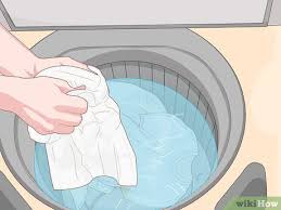 Woman hand washing gentle cotton underwear