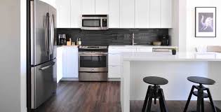 It blends the functional simplicity of a white kitchen with the warmth and texture of timber. Beautiful Floor Design Ideas For A Modern Home Flooring Bathroom Interiors