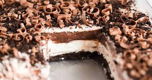 This ooey gooey chocolate lasagna with layers of chocolate cake, caramel, and cream cheese will definitely wow your friends! Chocolate Lasagna Recipe Balancing Motherhood