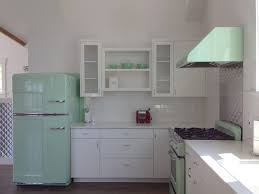 Bill Chill Fridge Next To What Appears To Be 24 Inch Depth Full Overlay White Cabinets With Plai Retro Kitchen Appliances Big Chill Appliances Retro Appliances