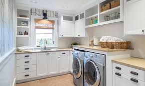 Cabinets and shelving can create a lot of space to store your laundry items.2. Eye Catching Laundry Room Shelving Ideas