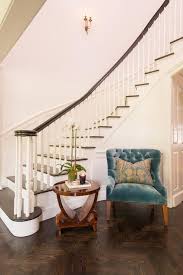 Most 42 tables seem to only allow one extension. Round Table On Curved Staircase Wall Traditional Entrance Foyer