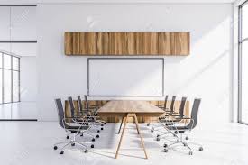 Laminate is a great writing surface offering durability and cleanablity and is one of the best ways to achieve a white table writing surface. Interior Of Modern Conference Room With White Walls Long Wooden Stock Photo Picture And Royalty Free Image Image 130264311