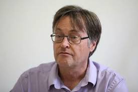 Charity boss reveals 'strain'