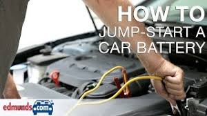 Connect the red clamp of your jumper cable to the positive terminal of the dead car's battery. How To Jump Start A Car Edmunds