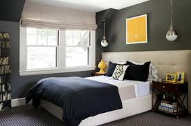 On top of the bed is a yellow pillow. The Best Men S Bedroom Wall Decor Ideas Decor Or Design