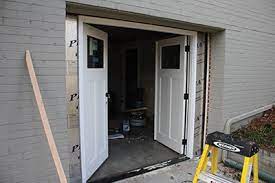 In many cases, a contractor can help you convert the door into an exterior wall space. Double Door Garage Conversion Extreme How To