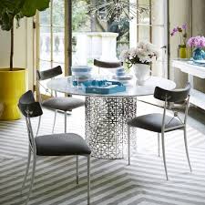 Jonathan adler's dedication to crafting fine modern lighting and home furnishings is reflected in his company motto, if your heirs won't fight over it, we won't make it.. Nixon Dining Table Burke Decor