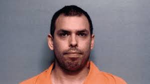 Man accused of barricading himself inside pharmacy arraigned