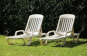 Shop for lawn chairs | white in patio chairs & seating at walmart and save. Two White Lawn Chairs In A Green Garden By Summer Stock Photo Picture And Royalty Free Image Image 11418964