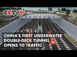 A cross section of the new tunnel showing the stacking of two double carriageways inside (image courtesy of hitachi zosen). China S First Underwater Double Deck Tunnel Opens T