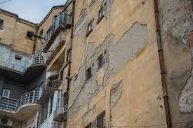 .blocuri gemene din piaţa naţiunilor unite, unde se vor muta 86 de familii care locuiesc în clădirile încadrate la risc seismic şi care vor intra în reabilitare. Bucuresti Cladiri Istorice Risc Seismic Inquam Photos