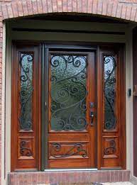 Beautiful Custom Designed Wood Entry Door With Hand Forged Iron Accents Custom Exterior Doors Custom Entry Doors Custom Front Doors