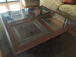 4.5 out of 5 stars. Wooden Coffee Table With Four Panel Glass Inserts