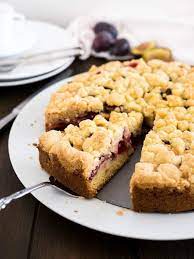 Dust with powdered sugar and serve. Plum Cake With Streusel German Plum Crumble Cake Plated Cravings