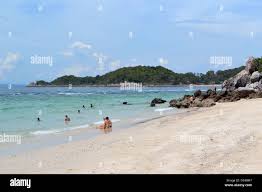 Tayai beach of Koh Larn - The Coral Island - at Pattaya - White sand and  blue sky Stock Photo - Alamy