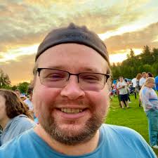 What story features a guy getting isekaid in one world, trapped in a void,  and sent to another system?