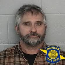 Dearborn man arrested for shining with loaded rifle