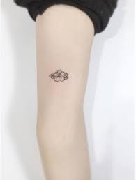 Minimalist Tattoos That Inspire You In 2020 Hibiscus Tattoo Tattoos Dainty Tattoos