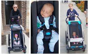Thule Cross With Thule Infant Sling 1 Month Old Being Pushed By Mom And Sister Thule Chariot Bassinet Cover Infant