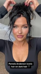 Pamela Anderson Iconic Dark Hair Transformation