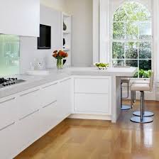 Dining table in the middle. Modern Small L Shaped Kitchen Designs