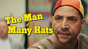 The Man of Many Hats