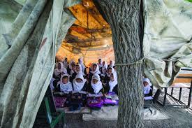 Afghan women wait in line to vote at a polling centre for the country's legislative election in herat province on october. Girls Access To Education In Afghanistan Hrw