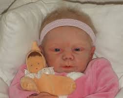 Solid silicone baby Erin with doe suede body " Artist: Joanna Kazmierczak