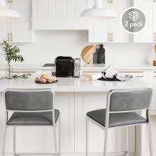 These stools boast an armless design with rounded, cutout backs. Nathan James Kira 24 Counter Bar Stool Set Of 2 Gray Leather Seat Silver Metal Frame 23102 The Home Depot