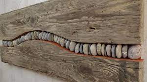 Top 10 diy ideas how to reuse old bike wheels. Treibholz Schwemmholz Bild Mit Fluss Steinen Http Www Fe Ma Design De Driftwood Wall Art Driftwood Art Driftwood Crafts